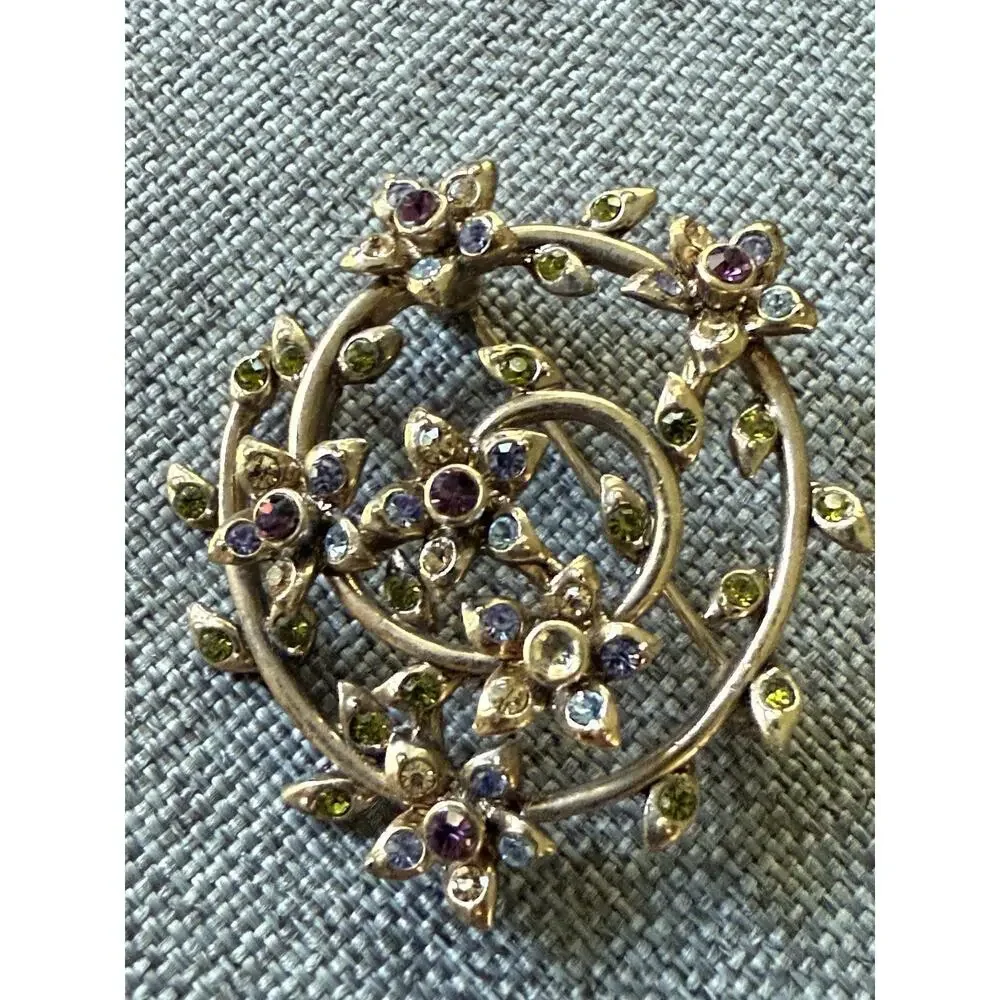 Vintage Signed Monet Gold Tone Multicolored Rhinestone Swirl & Floral Brooch Pin